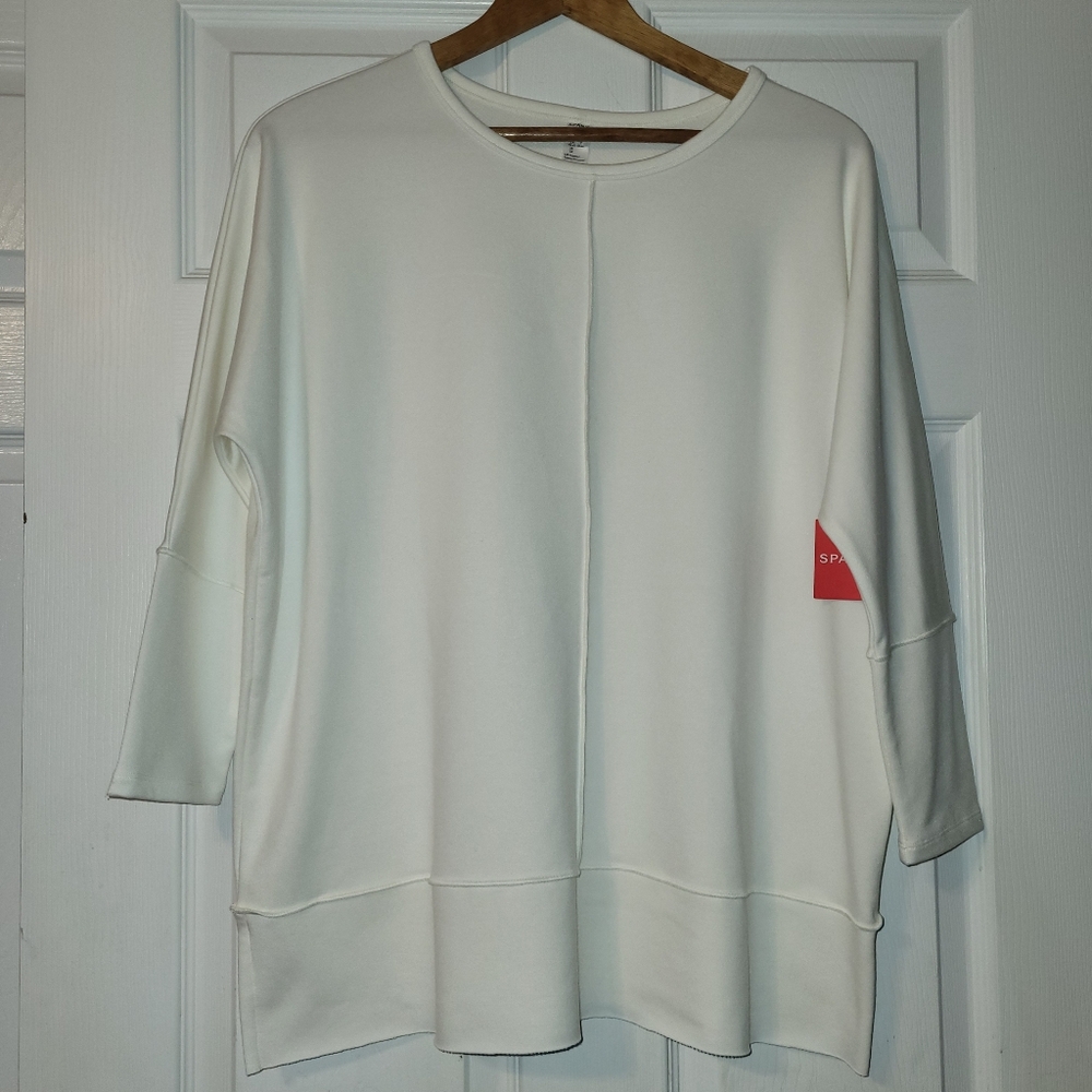 SPANX Cream Oversized Seam-Front Pullover Top with Red Logo Tab